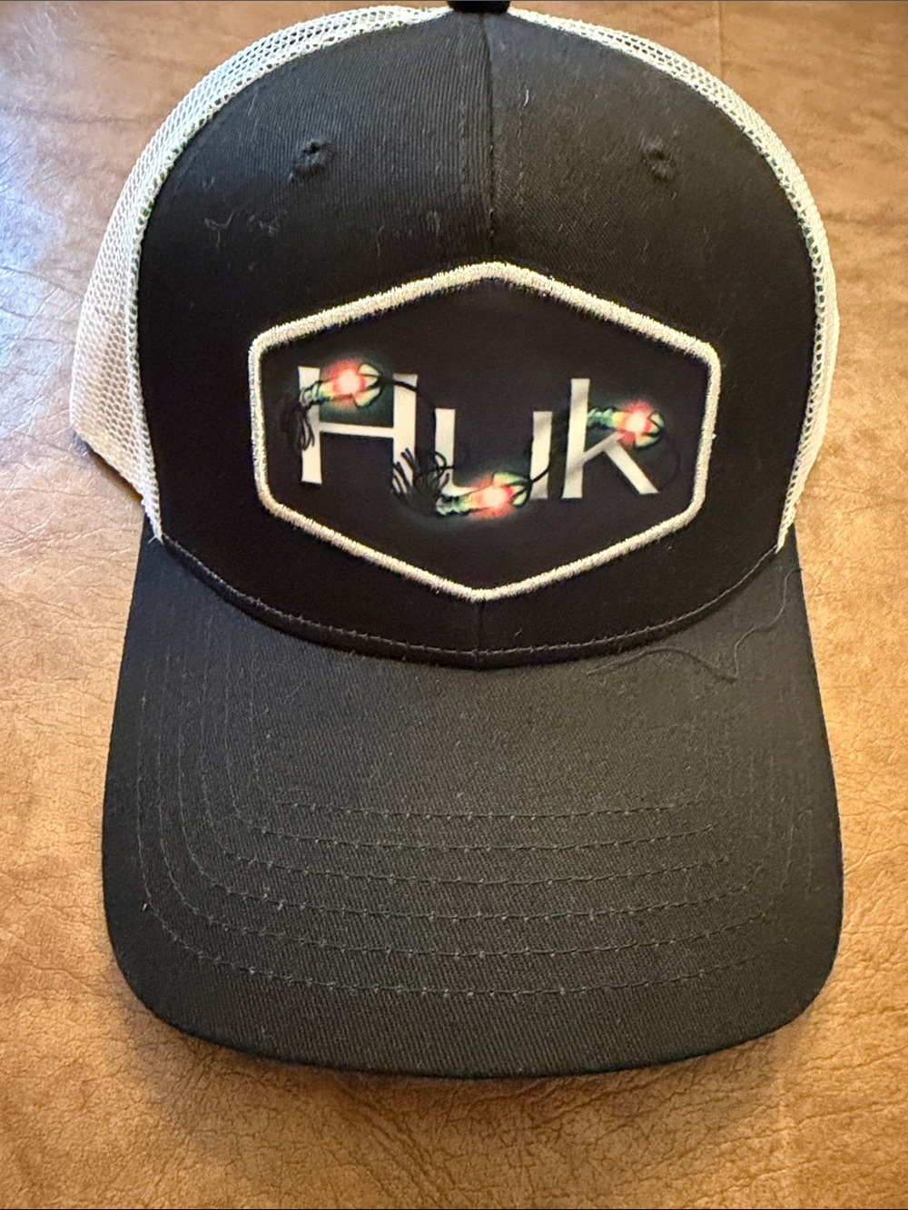 Huk Black and White Trucker Hat with Floral Logo